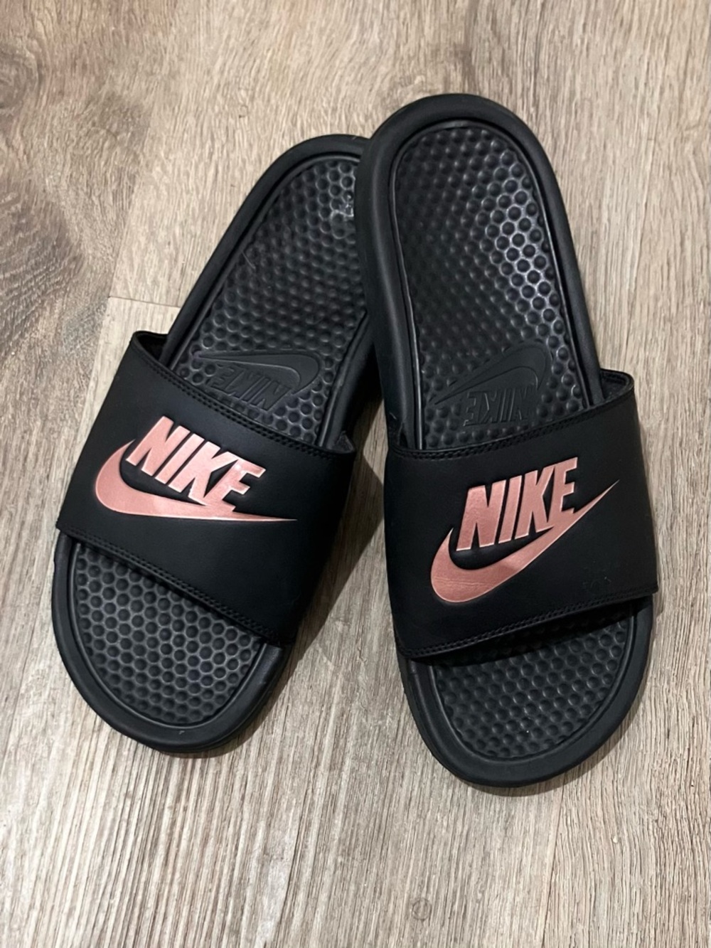 Nike Black Slides with Rose Gold Logo